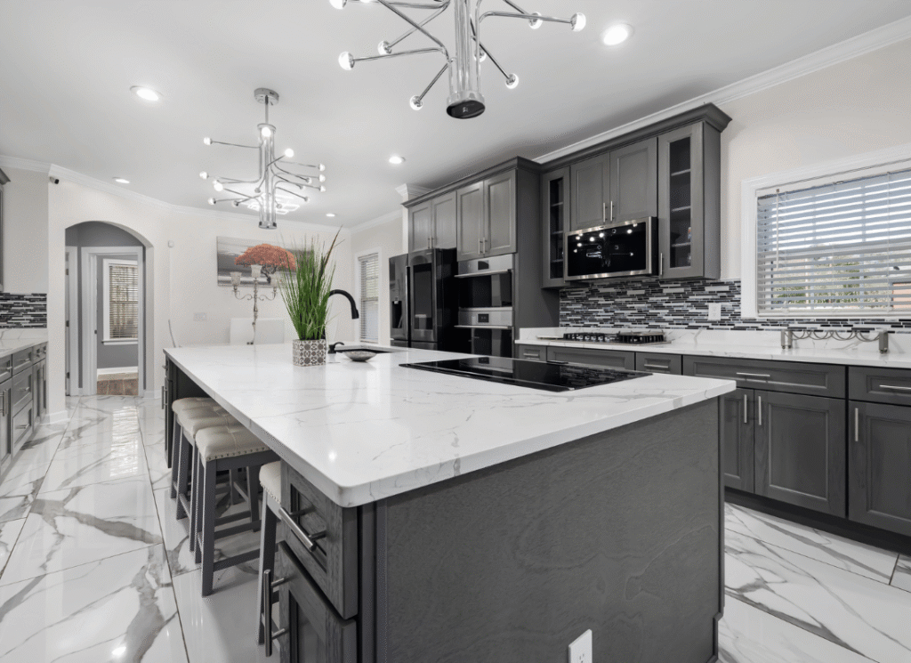 Kitchen with partial renovation showing updated cabinet doors and countertops while keeping existing layout